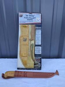 lot 12 image: Selection of 2 Fish Fillet Knives--The Viking with leather sheath and Rapala Martiini with Leather Sheath