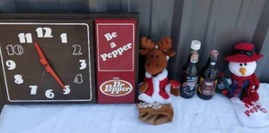 lot 39 image: Really Nice Dr. Pepper Lot Including Vintage Dr Pepper Clock, 2 Christmas Bottle Toppers and 2 Commemorative Unopened Bottles