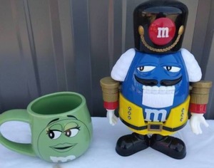 lot 63 image: M&M Nutcracker Candy Dispenser and Collectible Mug--Neither appears to have ever been used