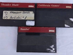 lot 69 image: Selection of 3 Sega Master System Video Games-- Thunder Blade, California Games and Rambo