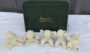 lot 86 image: Department 56 Snowbabies Tumbling in the Snow
