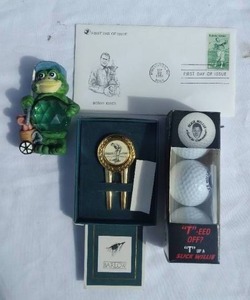 lot 119 image: Nice Selection of Golfing Collectibles--Including Slick Willy Golf Balls, First Issue Stamp, Frog with Crystal Ball and Barlow Divot Tool