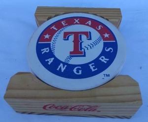 lot 127 image: Texas Rangers Drink Coasters in a Coca Cola Holder
