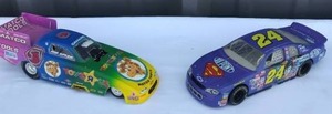 lot 143 image: 124th Scale Die Cast Cars--Jeff Gordon Superman Car and Toys R Us Funny Car