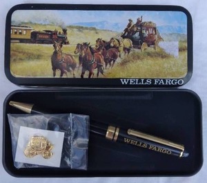 lot 156 image: Wells Fargo Ink Pen and Pinback in Collectors Tin