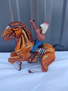 lot 169 image: Vintage Wind Up Native American on Horse Tin Toy