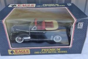 lot 185 image: Eagle Collectibles Premium 118 Scale Die Cast 1941 Chevy Deluxe Convertible---Bubble and box has some issues