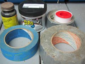 lot 32 image: FLEX PASTE NEW NEVER OPENED, LIQUID TAPE, PAINTERS BLUE TAPE, DUCK TAPE AND SEAL TAPE
