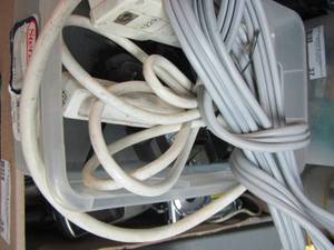 lot 35 image: WASHER PLUG, SMALL EXTENSION CORDS, PHONE AND COMPUTER CHARGERS AND A ETREX AND SONY CAMERA