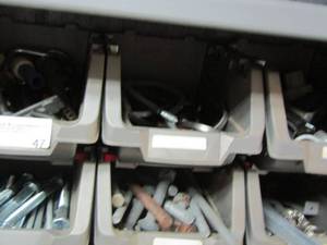 lot 47 image: 8 TOOL ORGANIZERS INCLUDES VARIOUS LARGE BOLTS, LARGE WASHERS, SMALL WHEELS AND VARIOUS OTHER TOOLS