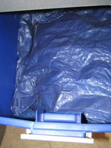 lot 85 image: blue tote of tarps