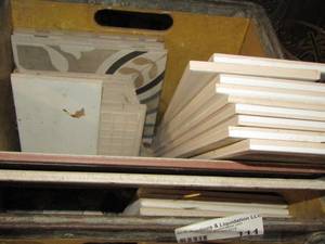 lot 111 image: Bordens wooden crate full of various tile pieces