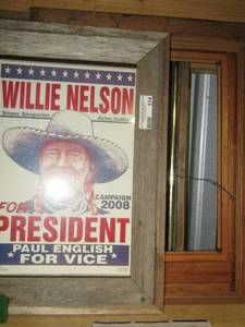 lot 114 image: 2 empty wooden frames- Willie nelson president picture with wooden frame