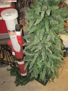 lot 110 image: 6ft skinny Christmas tree- 4ft Santa wooden