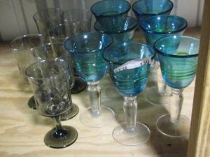 lot 130 image: 7 green and blue long stem martini glasses, 6 grey short  stem glasses
