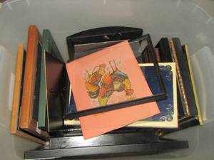 lot 149 image: tub full of various size photo frames