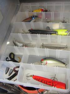 lot 163 image: Clear tackle caddy full of fishing LURES