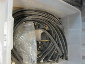 lot 174 image: tub of black bungee cords