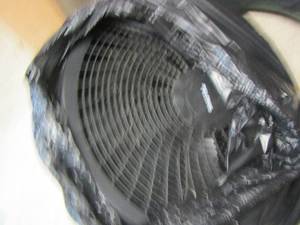 lot 204 image: Pelonis isolating fan in bag, needs to be put back together