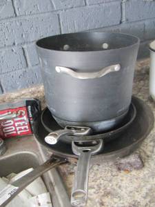 lot 208 image: CALPHALON Pot and Skillets