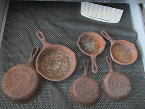 lot 213 image: 6 smaller cast iron skillets