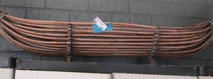 lot 249 image: wooden Boat made out of tree stems
