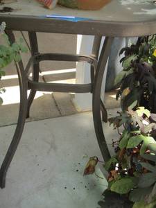 lot 245 image: small glass top outdoor table
