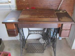 lot 255 image: singer sewing machine in good condition has thread inside