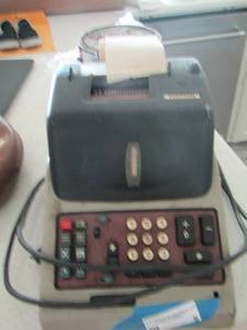 lot 8 image: olive TTI  vintage calculate register