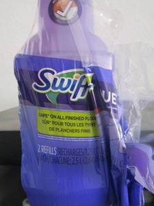 lot 344 image: new bottles of Swiffer wet jet spray