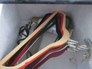 lot 351 image: hangers, iron and a can of starch