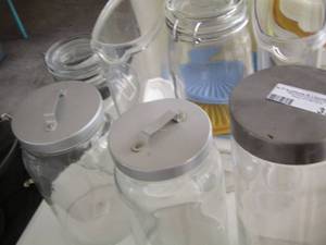 lot 371 image: canister with lids and cereal containers