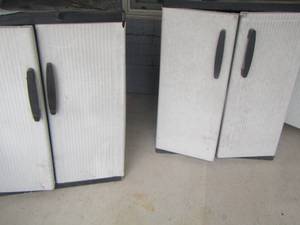 lot 318 image: 2 small outdoor storage cabinets approx 36 ht -  no contents included