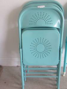 lot 19 image: 4 turquoise foldable chairs with holes in seat and back perfect condition