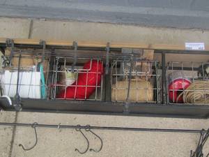 lot 402 image: wall storage shelf full of knitting string, yarn and such