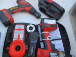 lot 33 image: black and decker stud finder- u-stone it flash light with small tools inside, black and decker drill