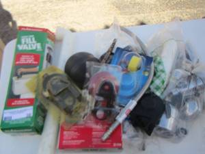 lot 38 image: bath repair lot, toilet items- faucets and more