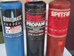 lot 43 image: 3 used bottles of propane with 3 torch ends