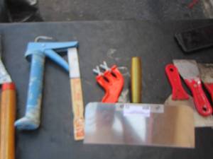 lot 52 image: putty knifes- scrappers- paint stick and more