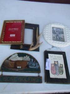 lot 137 image: 57 photo frames - hanging golf art