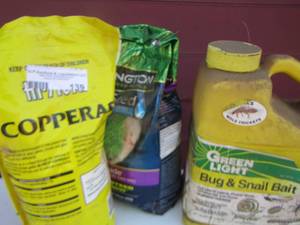 lot 139 image: Copperas - grass seed- Pennington grass seed- bug and snail bait