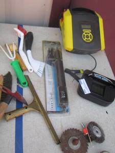 lot 153 image: Stanley battery charger, brushes, and more