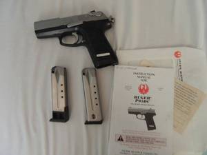 lot 1 image: RUGAR 9MM MODEL P95DC  2 CLIPS & HARD CASE