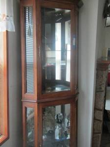 lot 29 image: CURIO CABINET GLASS FRONT 76X28X16 CORNER PIECE, CONTENTS NOT INCLUDED