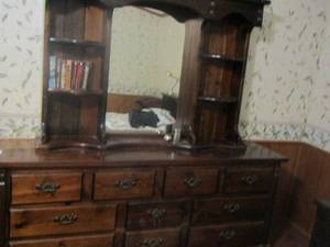 lot 123 image: Solid wood dresser 10 drawers has top piece with shelves 31 x 78 x 18  and mirror size 58x9x42