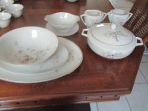 lot 144 image: Embassy China serving dishes, Serving Platters qty 2, Salad Bowl, Gravy Boat, Sugar and Creamer, Covered Serving Bowl  7 pcs x $
