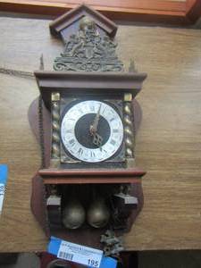 lot 195 image: small vintage coocoo clock, missing the weights