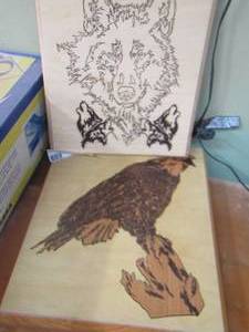 lot 15 image: handmade wooden plaque of wolfs and bears, handmade eagle plaque qty 2