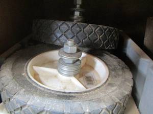 lot 42 image: grey tub of wheels , misc. tools