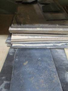 lot 62 image: STACK OF BLACK BOARDS